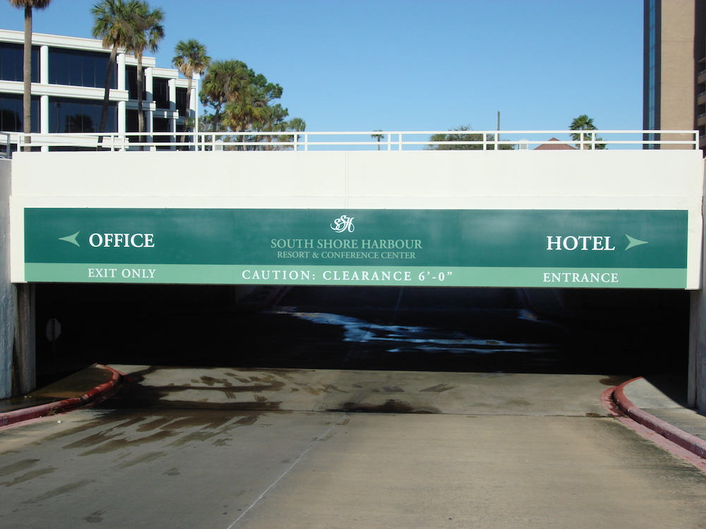 Houston outdoor signage for South Shore Harbor providing directions to the hotel and the office