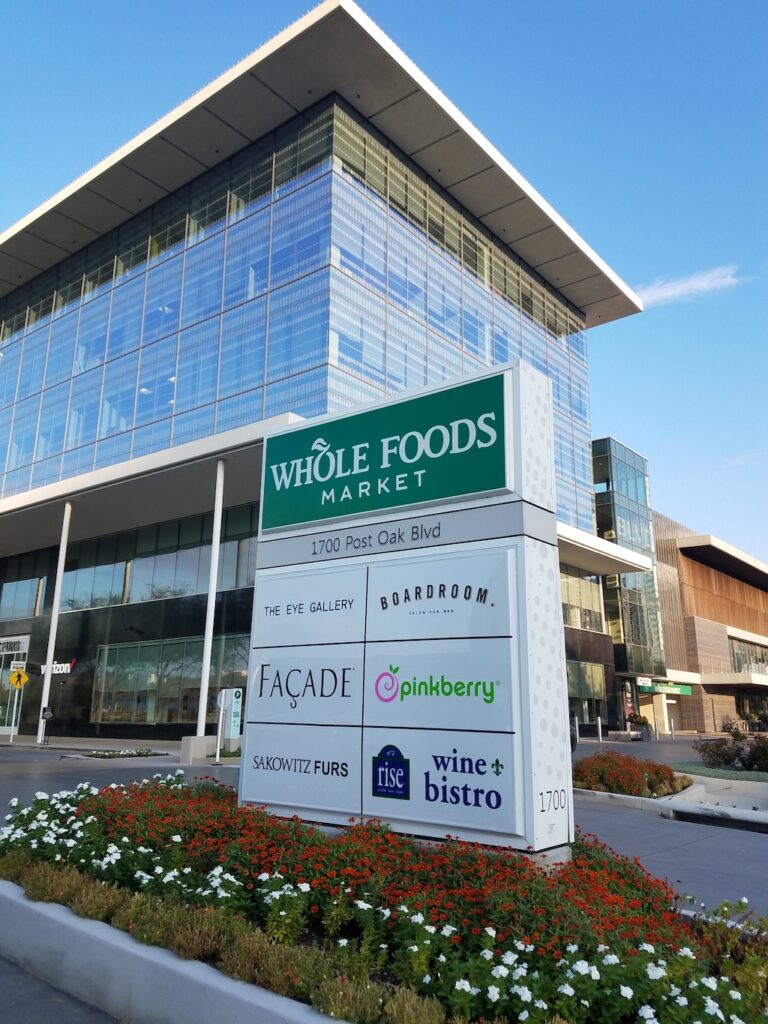 Multi tenant sign in boulevard with flowers created by Houston custom signs