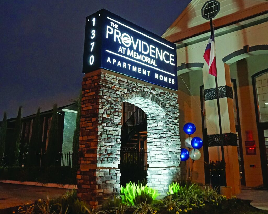 An illuminated brick monument sign built by 4D SignWorx for Providence at Memorial in Houston