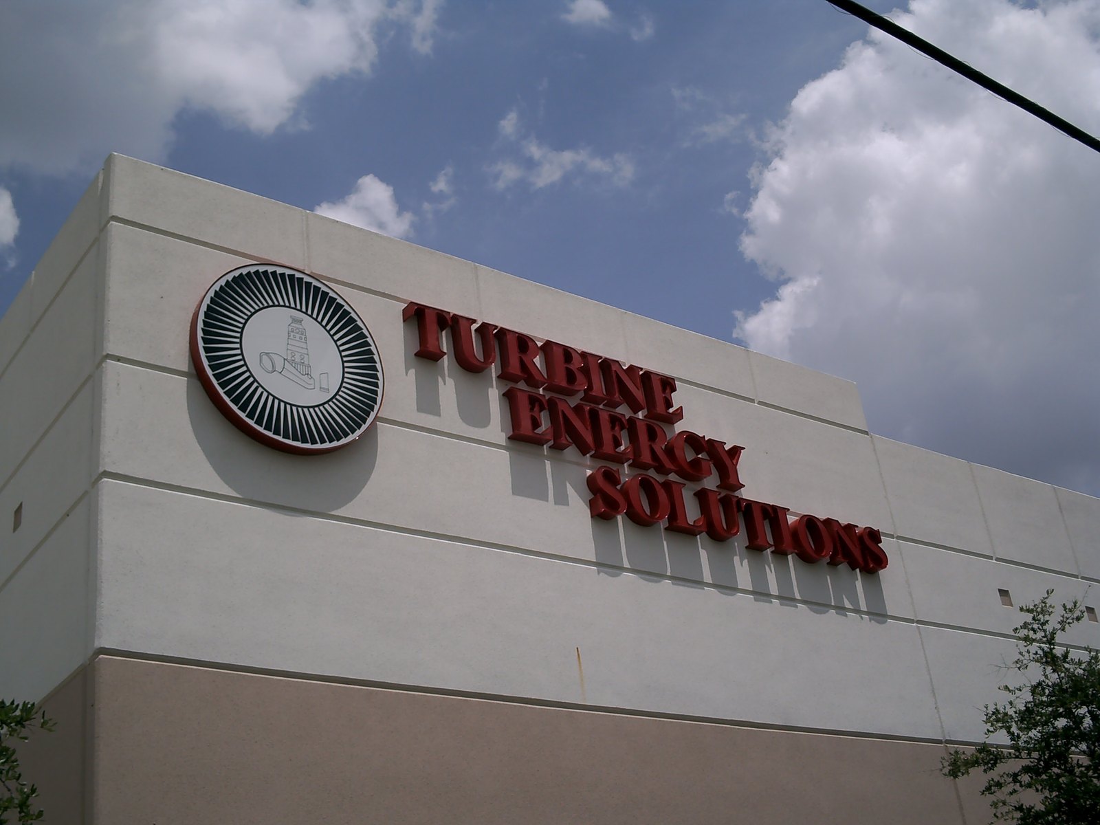 Illuminated dimensional channel letters and a logo medallion for Turbine Energy Solutions, fabricated and installed by 4D SignWorx in Houston
