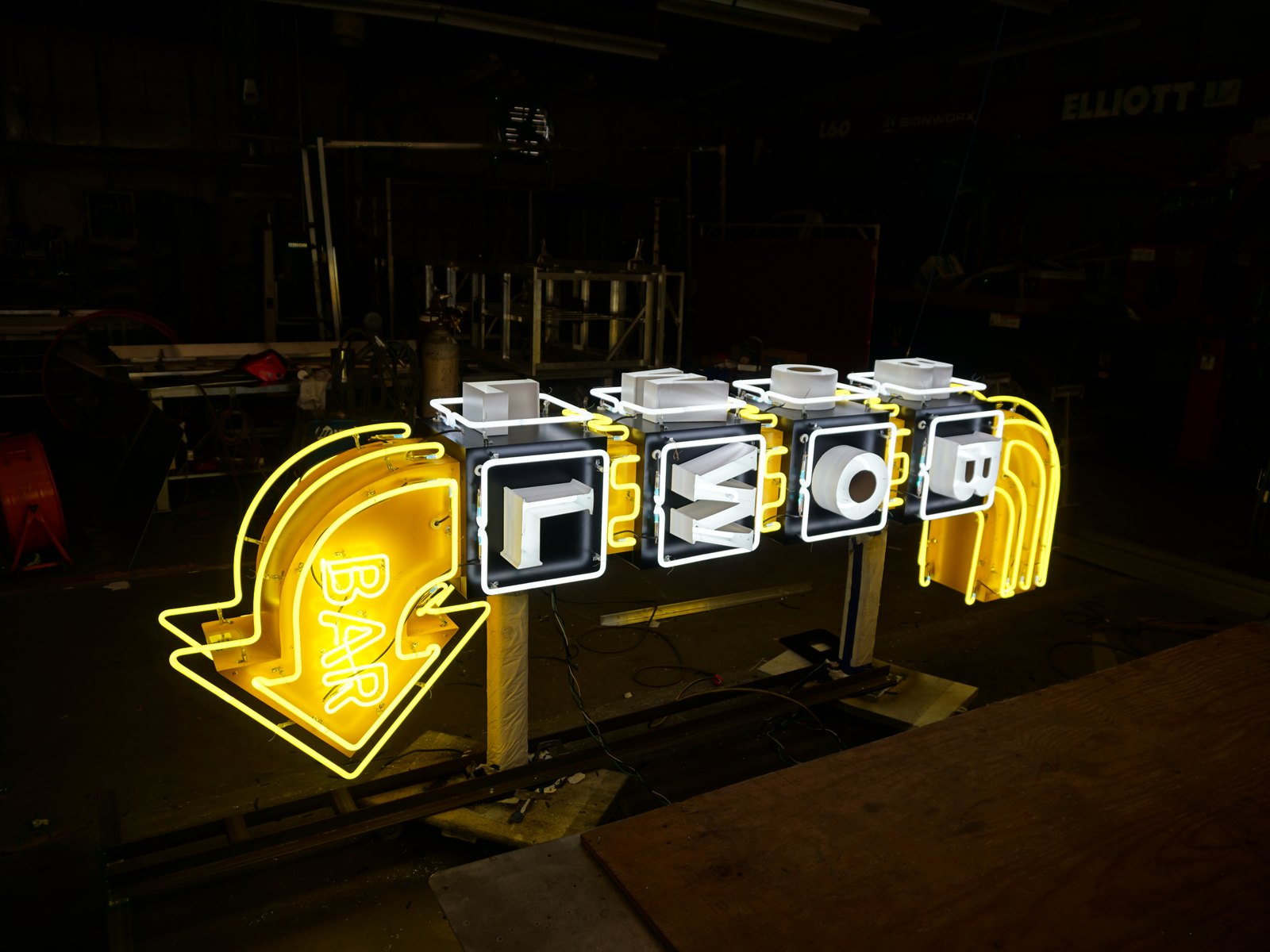 Neon channel letters lit and tested on the 4D SignWorx shop floor in Houston during fabrication