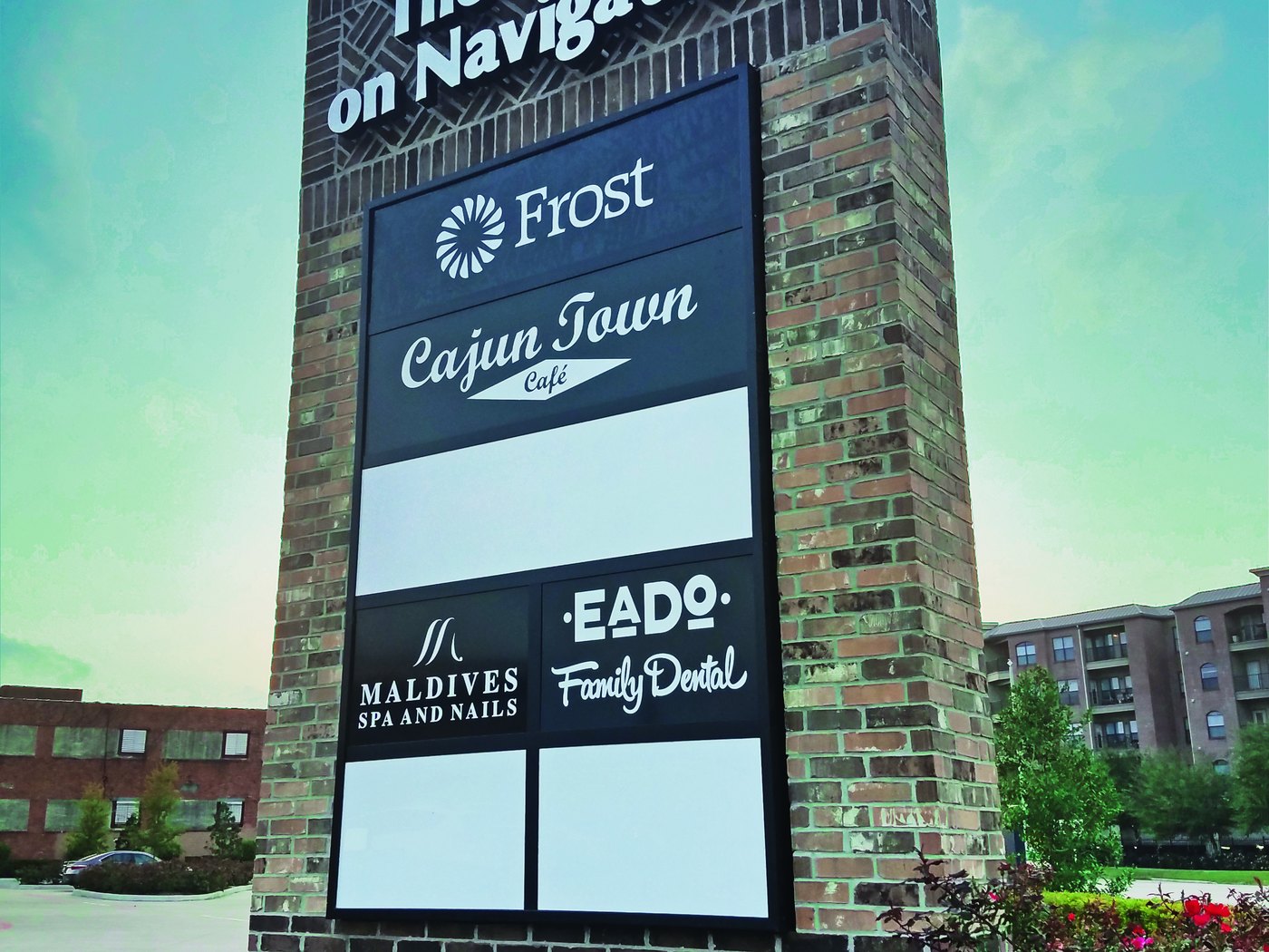 A finished multi-tenant retail pylon built by 4D SignWorx in Houston